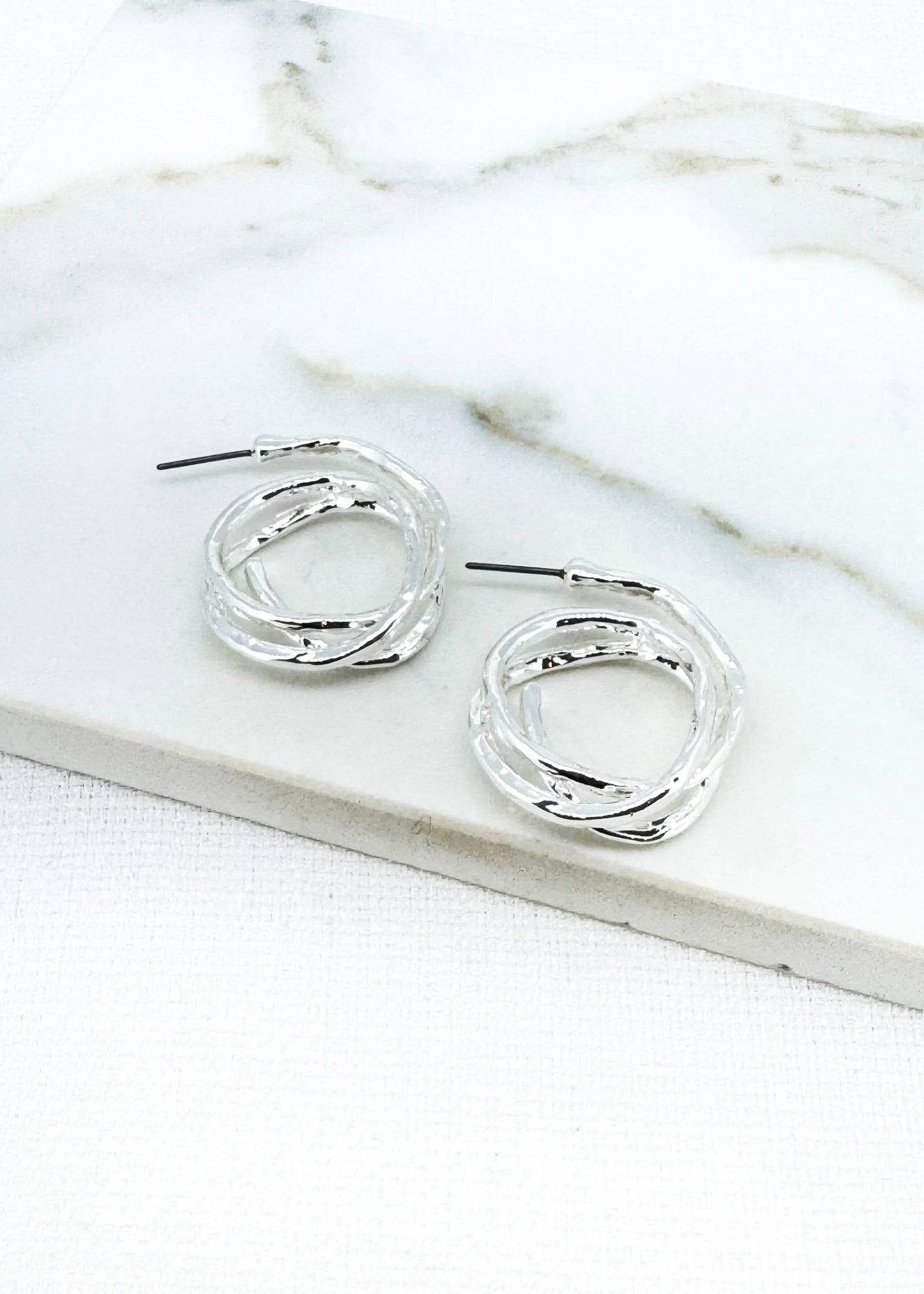 Silver twisted hoop earring